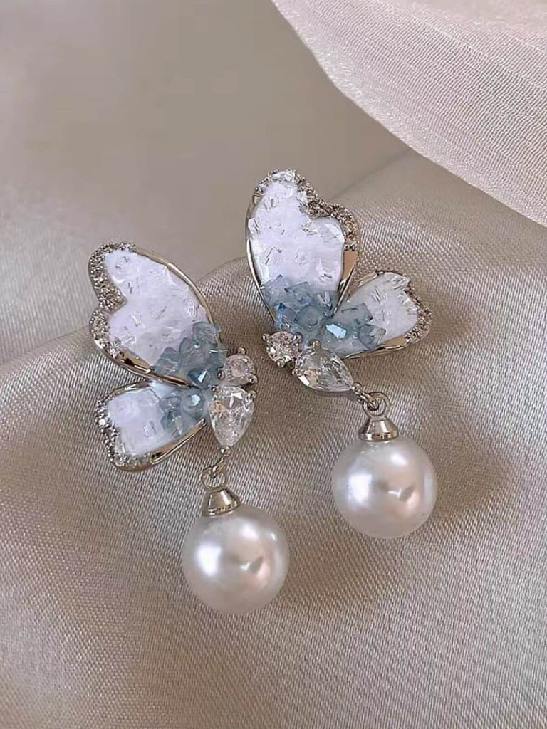 Boucles d'oreilles en perles papillon en cristal bleu clair