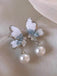 Boucles d'oreilles en perles papillon en cristal bleu clair