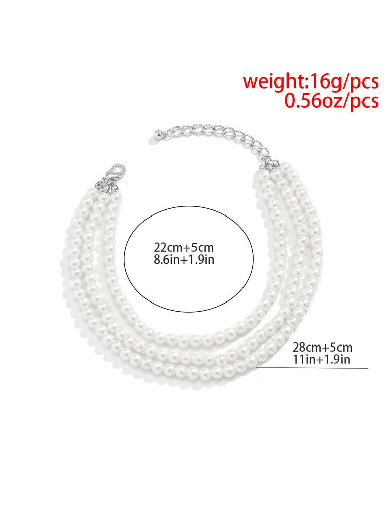 Bracelet de cheville à pampilles et perles blanches