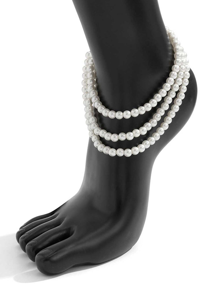 Bracelet de cheville à pampilles et perles blanches
