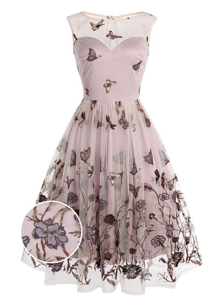 Robe trapèze violette en dentelle papillon années 1950