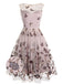 Robe trapèze violette en dentelle papillon années 1950