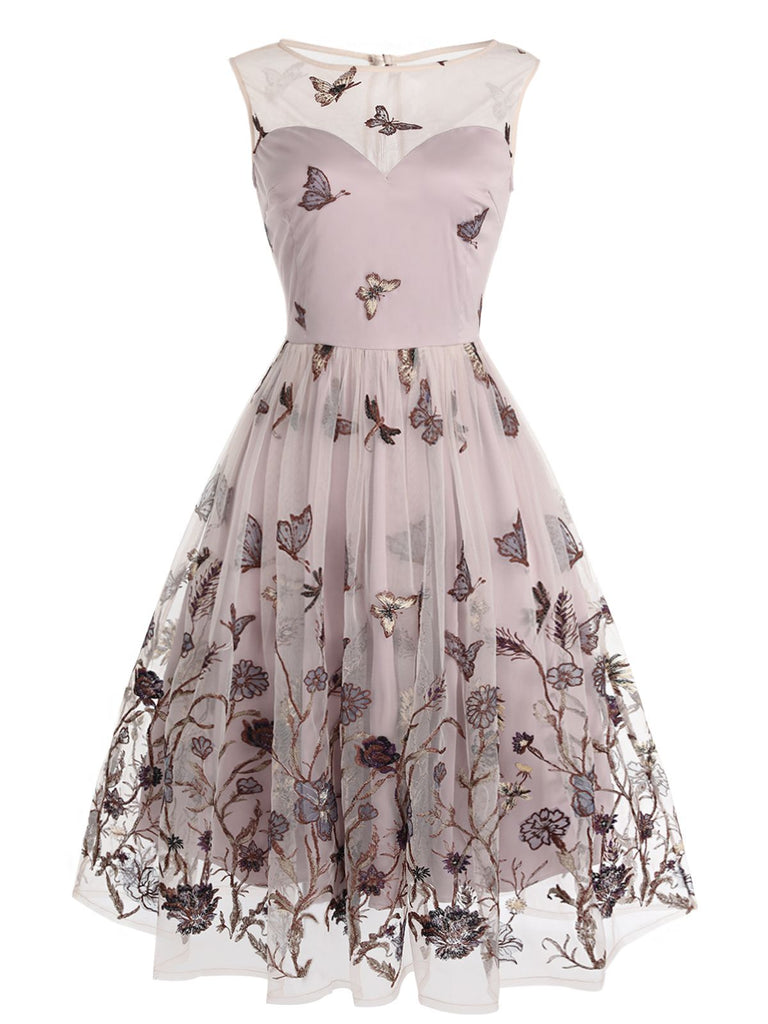Robe trapèze violette en dentelle papillon années 1950