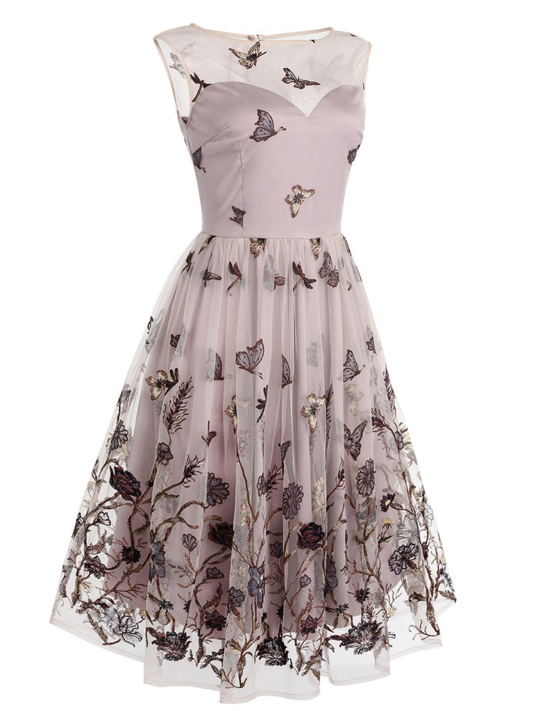 Robe trapèze violette en dentelle papillon années 1950