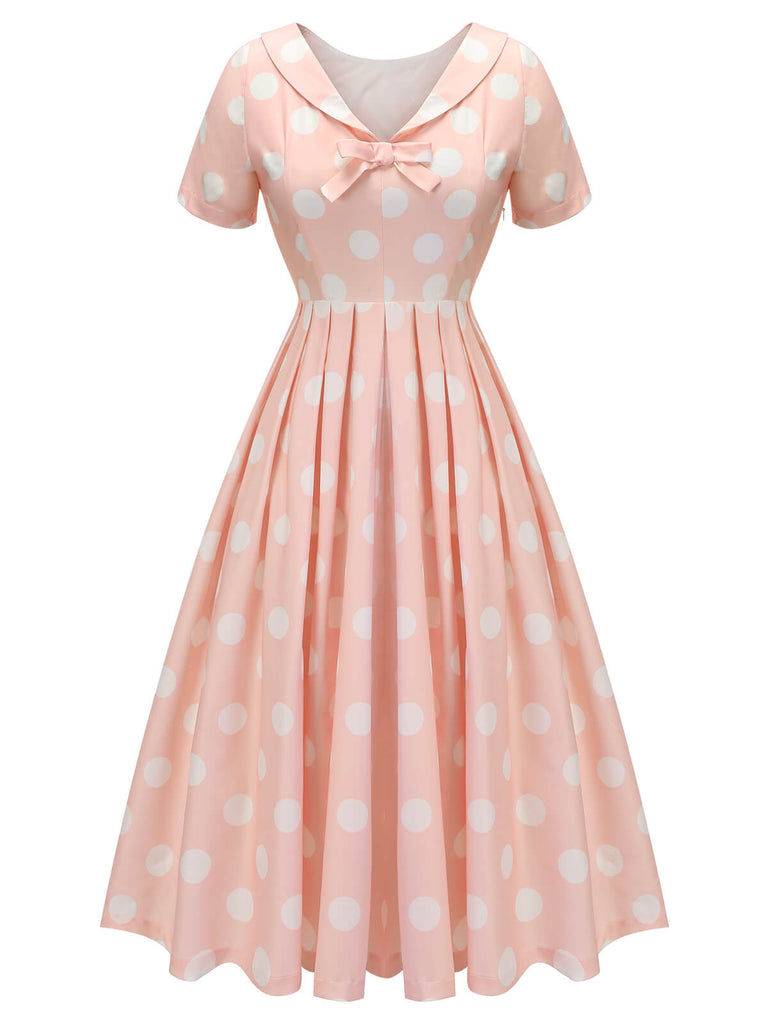 Robe rose pêche à pois années 1940 à manches courtes