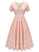 Robe rose pêche à pois années 1940 à manches courtes