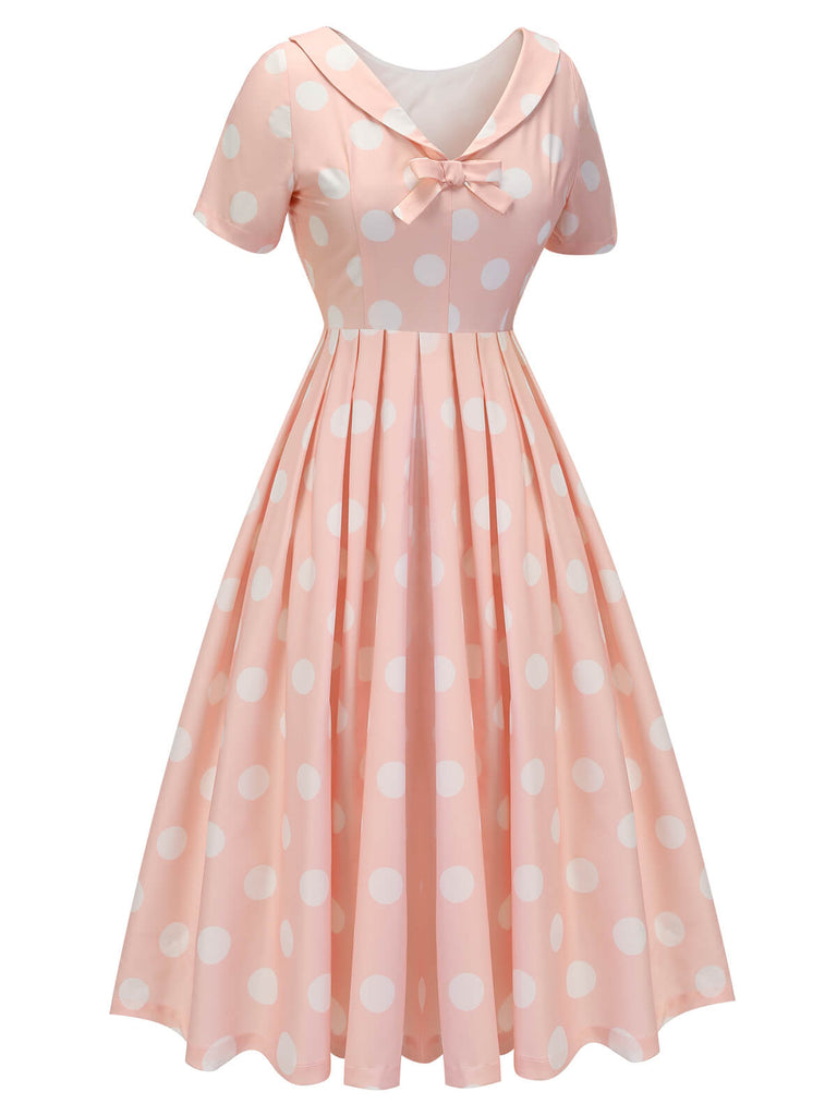 Robe rose pêche à pois années 1940 à manches courtes