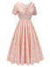 Robe rose pêche à pois années 1940 à manches courtes