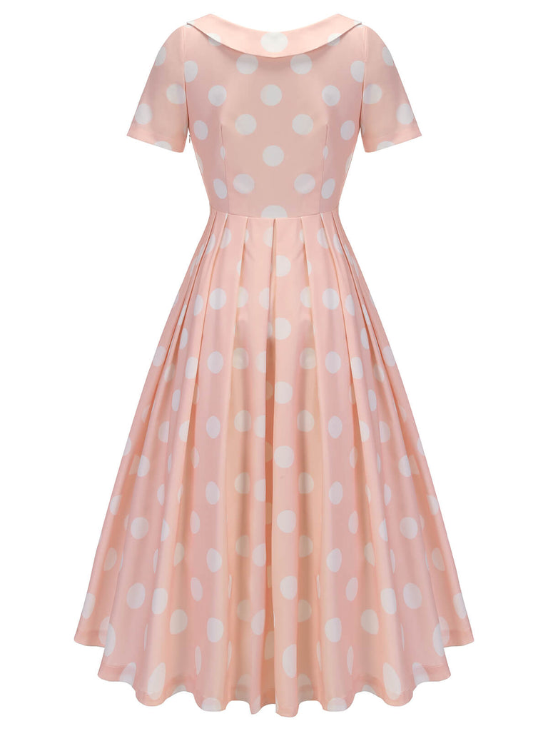 Robe rose pêche à pois années 1940 à manches courtes