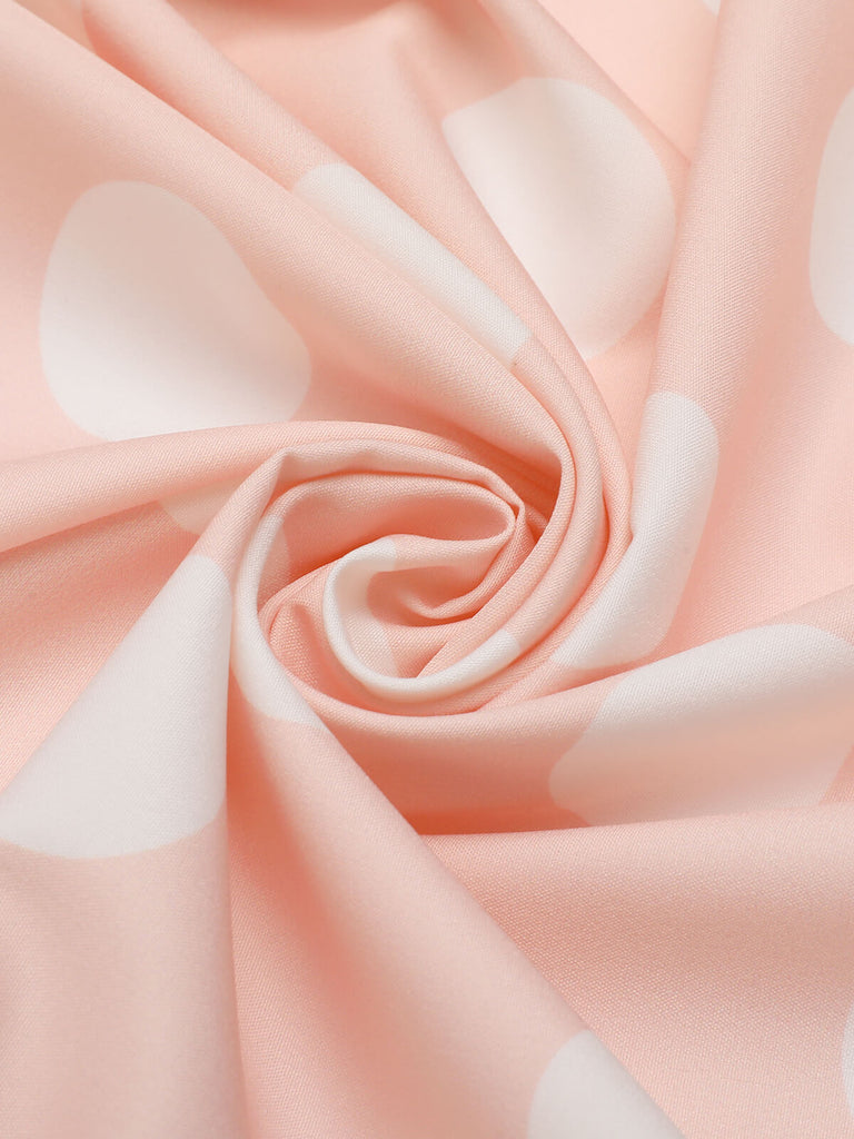 Robe rose pêche à pois années 1940 à manches courtes