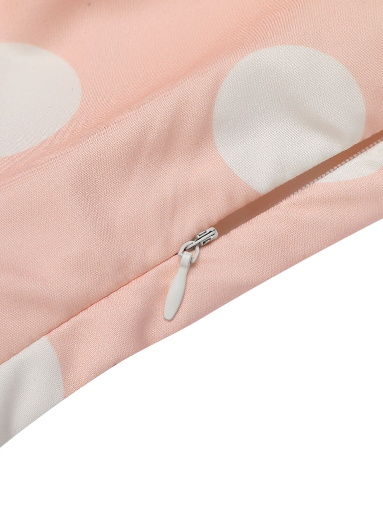 Robe rose pêche à pois années 1940 à manches courtes