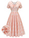 Robe rose pêche à pois années 1940 à manches courtes