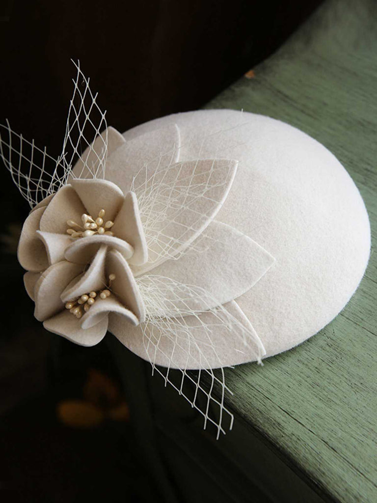 Brerets en laine en maille à décor floral vintage